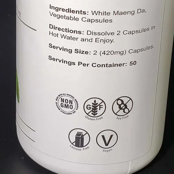 Label detail of White Maeng Da kratom capsules showing ingredients and directions for use, emphasizing clarity and compliance with health guidelines.
