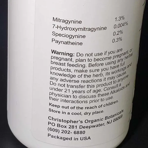 Warning label and list of kratom alkaloids on White Maeng Da kratom capsules, emphasizing safety and ingredient transparency.