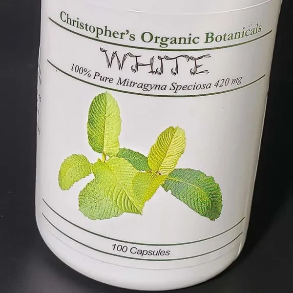 Front view of a bottle containing White Maeng Da kratom capsules, clearly displaying the product label and capsule details.