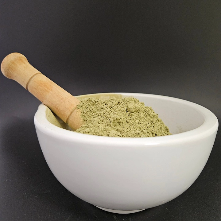 Yellow Maeng Da Batch 151210 kratom powder displayed in a bowl