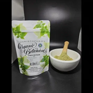 Premium Green Vietnam Kratom powder from Batch 151320, finely ground with a vibrant green color, displayed in a clean, natural setting.