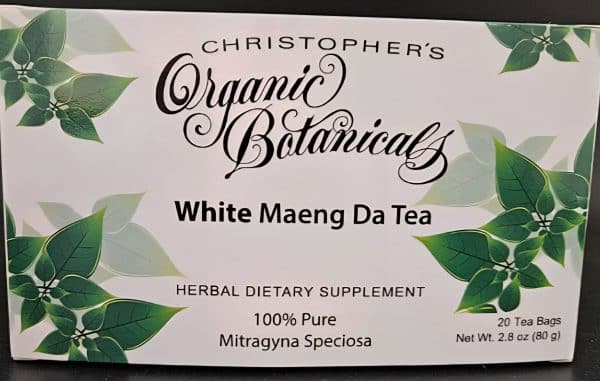Flat lay image of White Maeng Da kratom tea bag box on a clean surface.